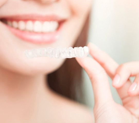 Beauty woman smile happily with invisible braces