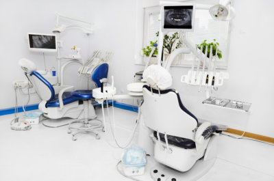 Dental office with blue dental chair